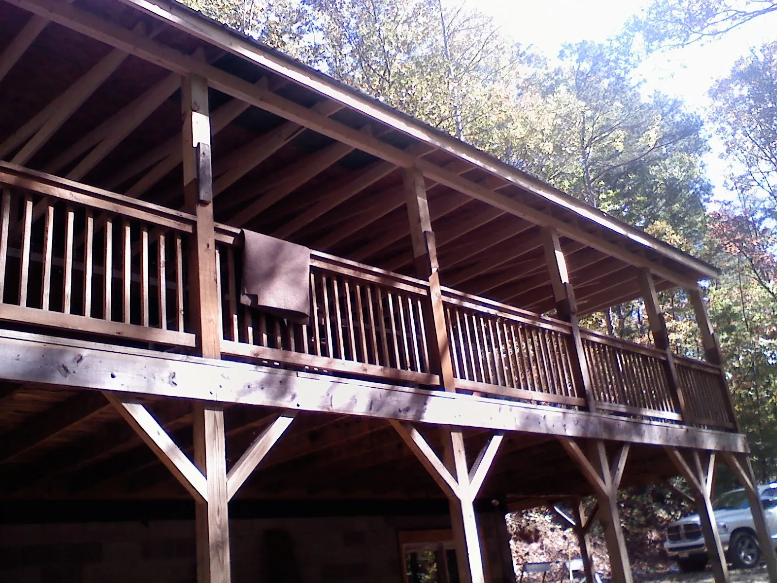 Timber framing under a new elevated porch and deck — Roof Leak Repair in Andalusia by Roofing Brothers